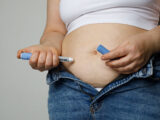 Woman injecting Semaglutide Ozempic injection control blood sugar levels